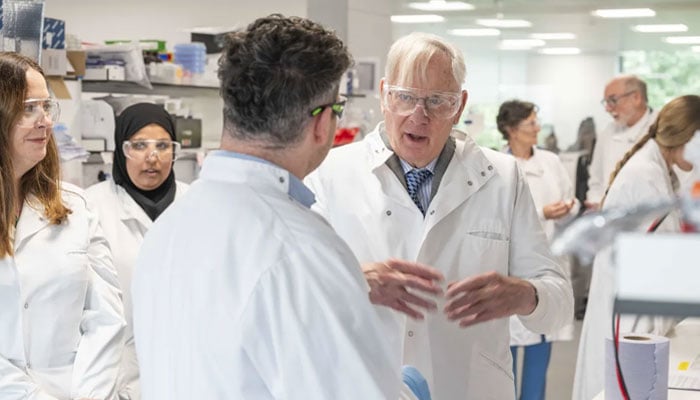 Duke of Gloucester wears white lab coat during recent visit
