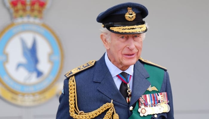 King Charles makes surprise appearance to salute RAF squadron