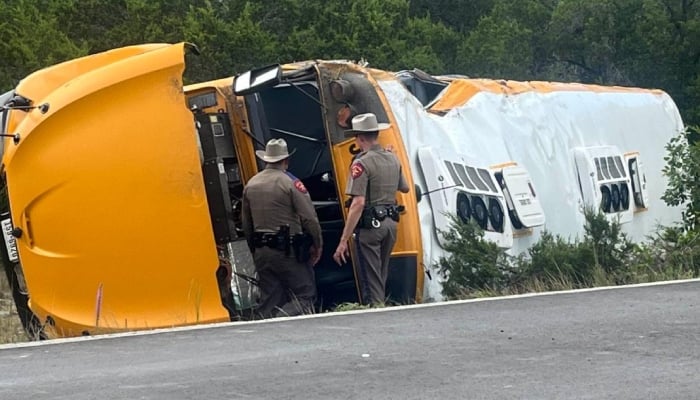 School bus with 43 onboard overturns in Texas, injuring 10