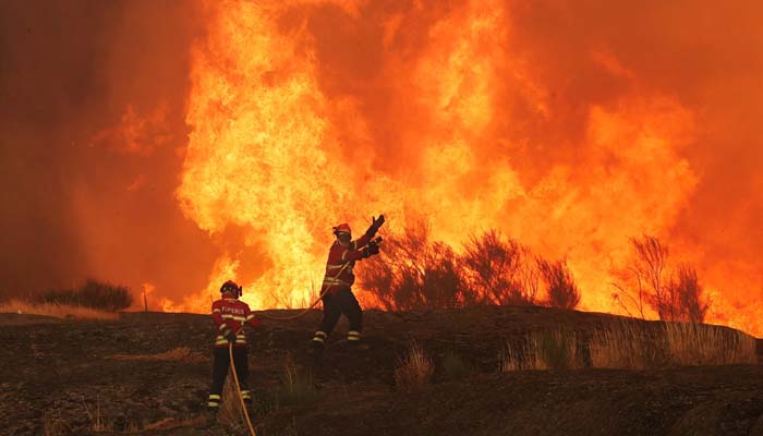 European wildfires force thousands to evacuate as death toll climbs