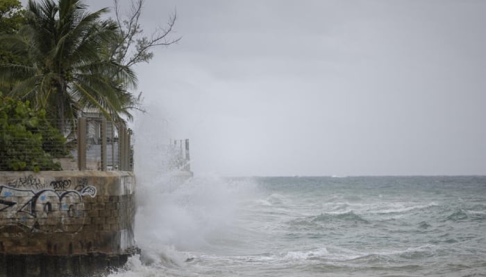 Hurricane Erin weakens to category 3 after rapid intensification to category 5