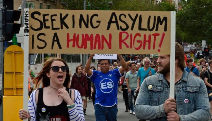 UK government announces fast-track asylum appeals amid hotel protests