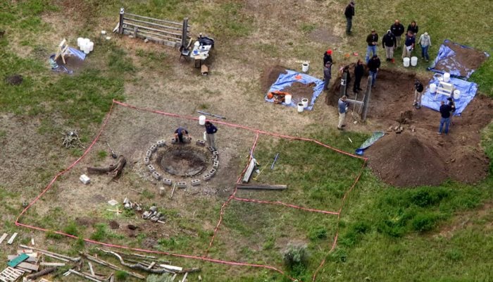 Manhunt for alleged killer halts after bones found near 3 daughters bodies