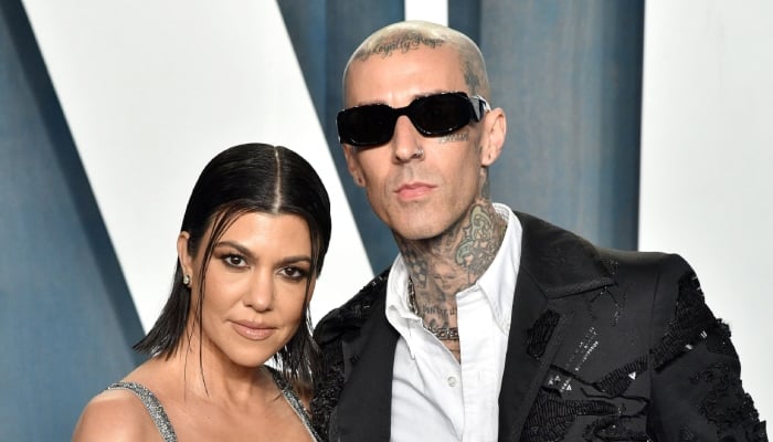 Kourtney Kardashian, Travis Barker take family vacation with son: See