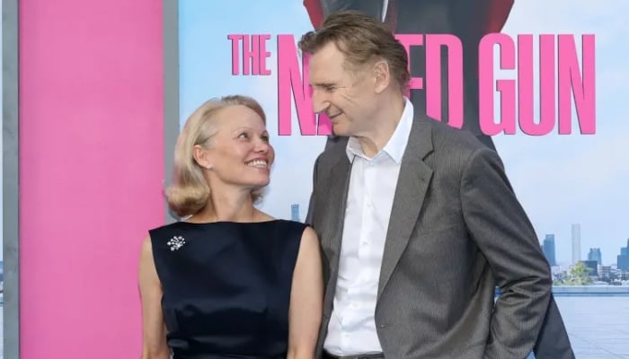 Pamela Anderson rejects claims of faking Liam Neeson romance