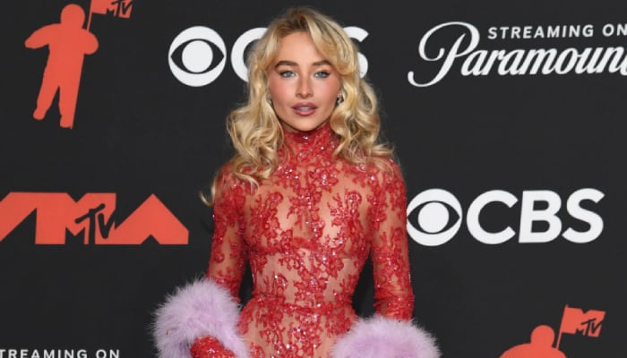Sabrina Carpenter brings old Hollywood glam to 2025 VMAs in sheer red gown