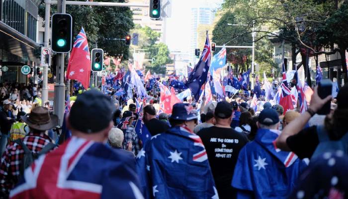 Australia sees massive protests as thousands march against government, racism