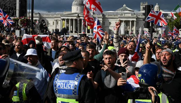 London protests leave 8 charged after violent clashes at rally
