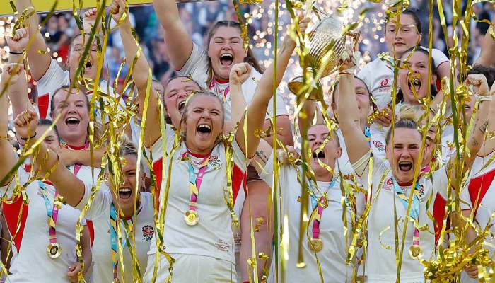 Red Roses lift the Womens Rugby World Cup Trophy after thrilling win over Canada