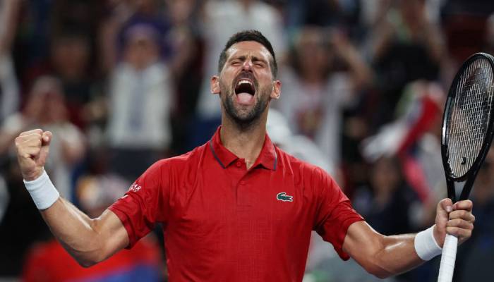 Novak Djokovic battles sweltering heat to reach Shanghai Masters fourth round