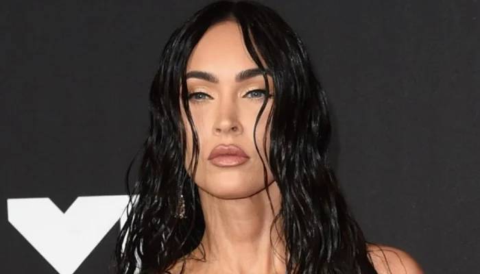 Megan Fox chokes back tears recounting paparazzi scrutiny