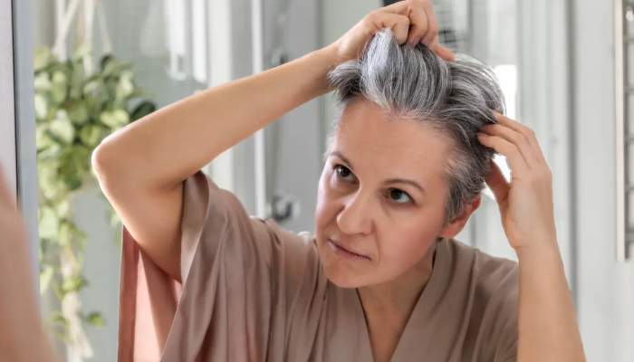 Your gray strands might be saving you from skin cancer