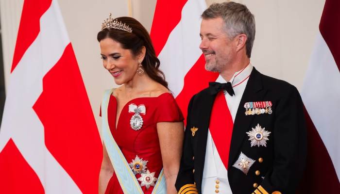 Queen Mary charms in elegant red gown as she joins Frederik for State Banquet