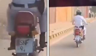کراچی: ٹریفک پولیس اہلکار کا ’ای چالان‘ سے بچنے کیلئے جوگاڑ سوشل میڈیا پر وائرل