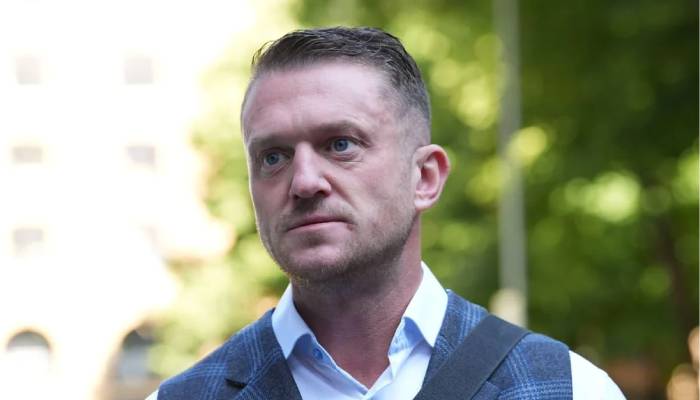 Tommy Robinson cleared of terrorism-related charge over phone refusal