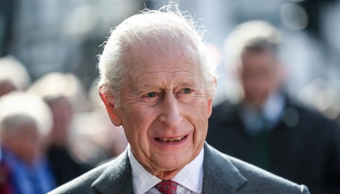 King Charles cracks cheeky joke about his broken arm at key veterans meeting
