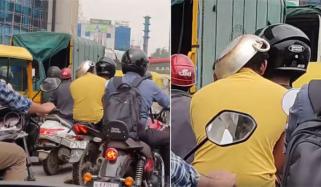 ویڈیو: موٹرسائیکل سوار نے کڑاہی کو بطور ہیلمٹ استعمال کرنا شروع کردیا 