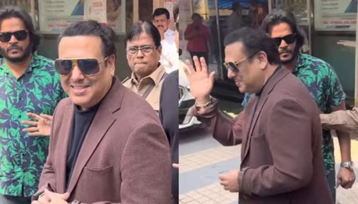 اداکار گووندا اسپتال سے باہر آتے ہوئے صحافیوں کو دیکھ کر مسکراتے ہوئے ہاتھ ہلا رہے ہیں—تصاویر بشکریہ بھارتی میڈیا