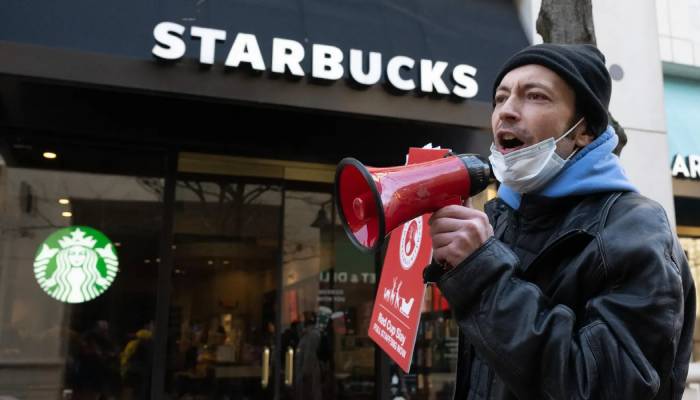 Starbucks strike hits 65 US cities on Red Cup Day amid pay, labour disputes