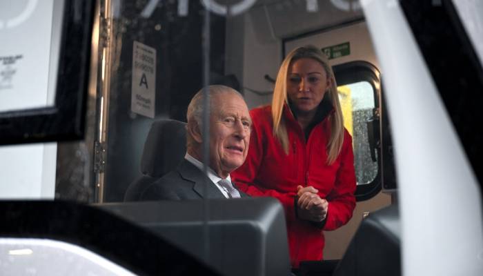 King Charles vibes to ‘She’s Electric’ as he drives Wales metro on 77th birthday