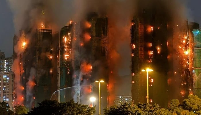 Hong Kong fire leaves four dead as massive blaze engulfs residential buildings