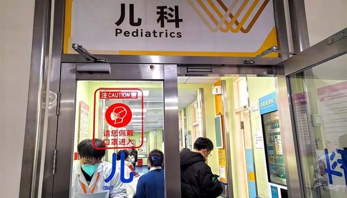 China reports major flu surge in 17 provincial regions