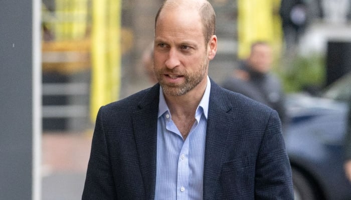 Prince William beams as he cuts giant cake for key celebration