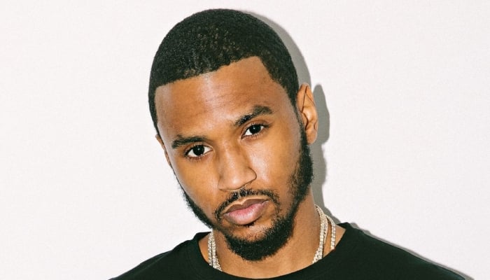 Singer Trey Songz booked on serious charges after hitting club staffer