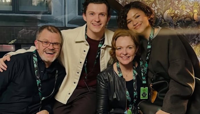 Zendaya beams with Tom Holland and his parents in rare family snap