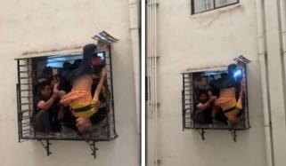 نیند کے دوران 10ویں منزل سے گرنے والا شخص دو منزل نیچے جالی میں پھنس گیا