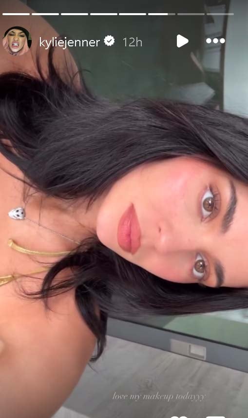 Kylie Jenner flaunts fit figure in gold metallic bikini
