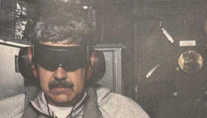 US to run Venezuela as blindfolded, captured Maduro arrives in New York