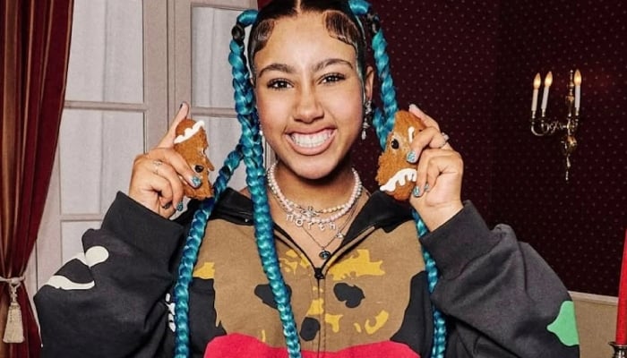 North West flaunts new piercing, black grills after Christmas makeover