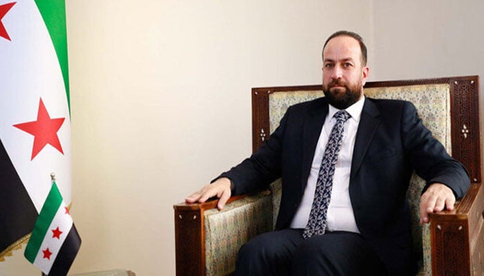 شامی وزیرِاطلاعات حمزہ المصطفیٰ—تصویر بشکریہ غیر ملکی میڈیا