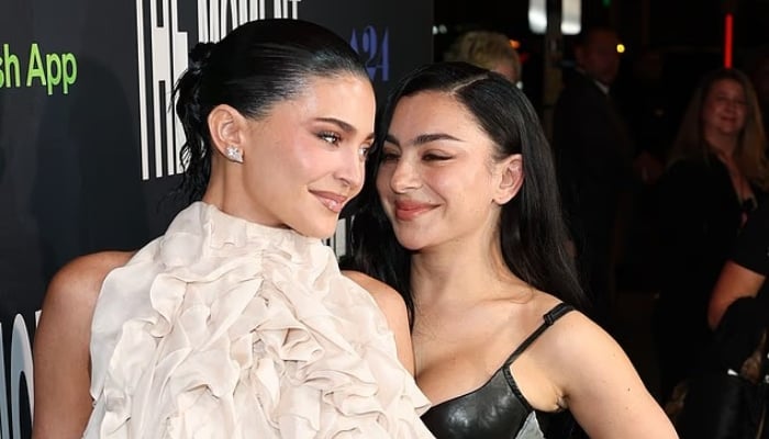 Kylie Jenner goes solo at ‘The Moment’ premiere with Charli XCX