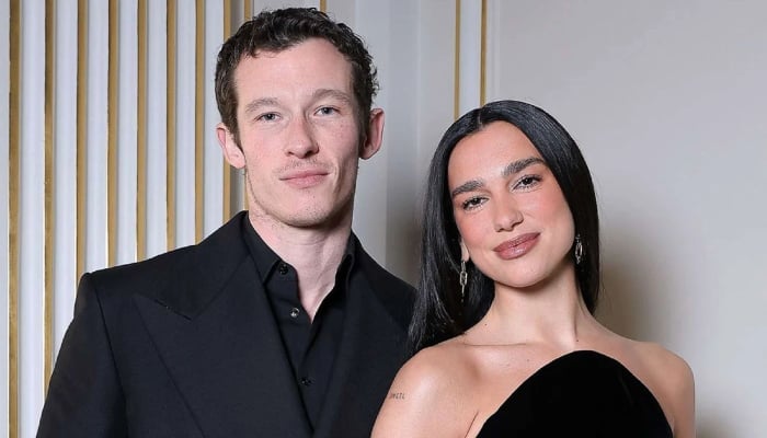 Dua Lipa reacts after paparazzi disrupt cozy Paris date with Callum Turner