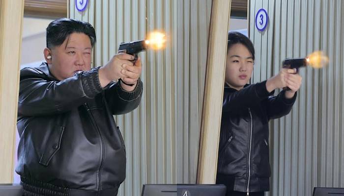 Kim Jong Un tests guns with daughter at arm factory, new hint at succession