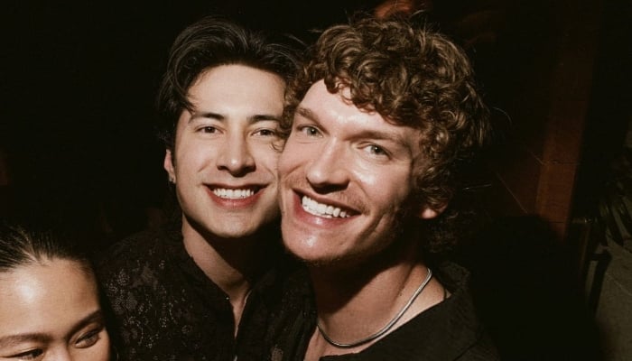 Heated Rivalry stars Connor Storrie, Hudson Williams reunite at pre-Oscars party