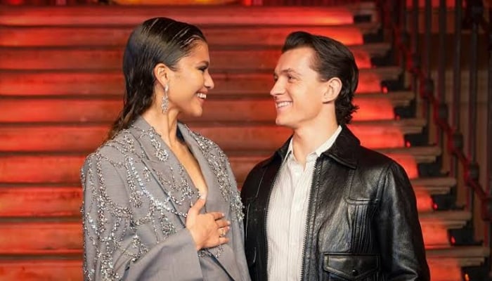 Tom Holland swoons fans by quietly melting over Zendaya during The Drama premiere