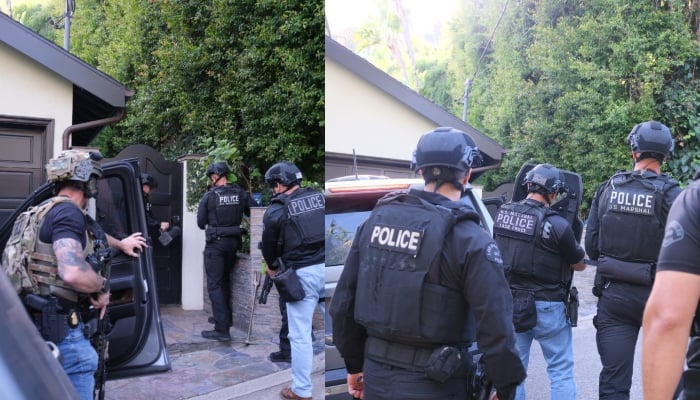 Police at the scene to arrest D4vd