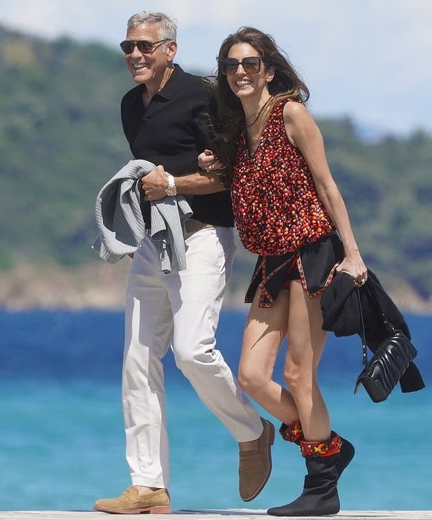 George Clooney, Amal Clooney pack on PDA during romantic 65th birthday getaway
