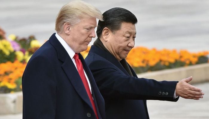 Trump arrives in Beijing for high-stakes trade and security talks