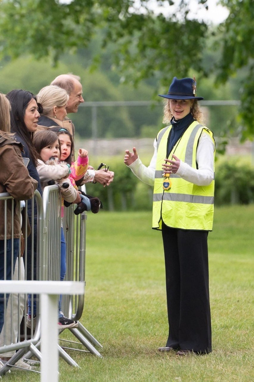 Lady Louise Windsor chatting with Prince Edward and Sophie
