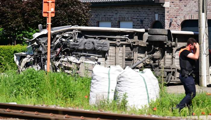 Belgium train crash: School bus collision leaves four dead including children