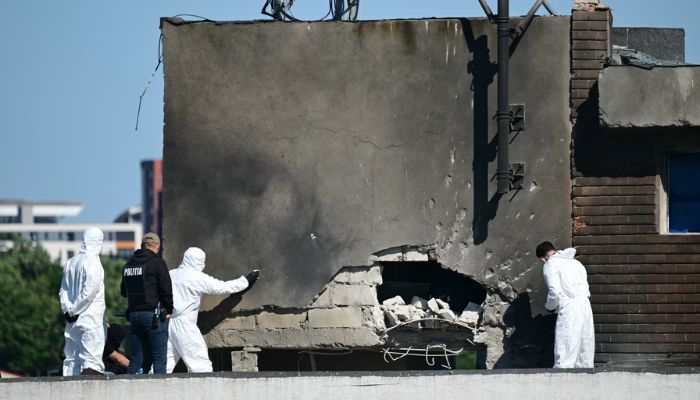 A Russian drone strike on a residential building in Galati, Romania, injured two, marking a major escalation
