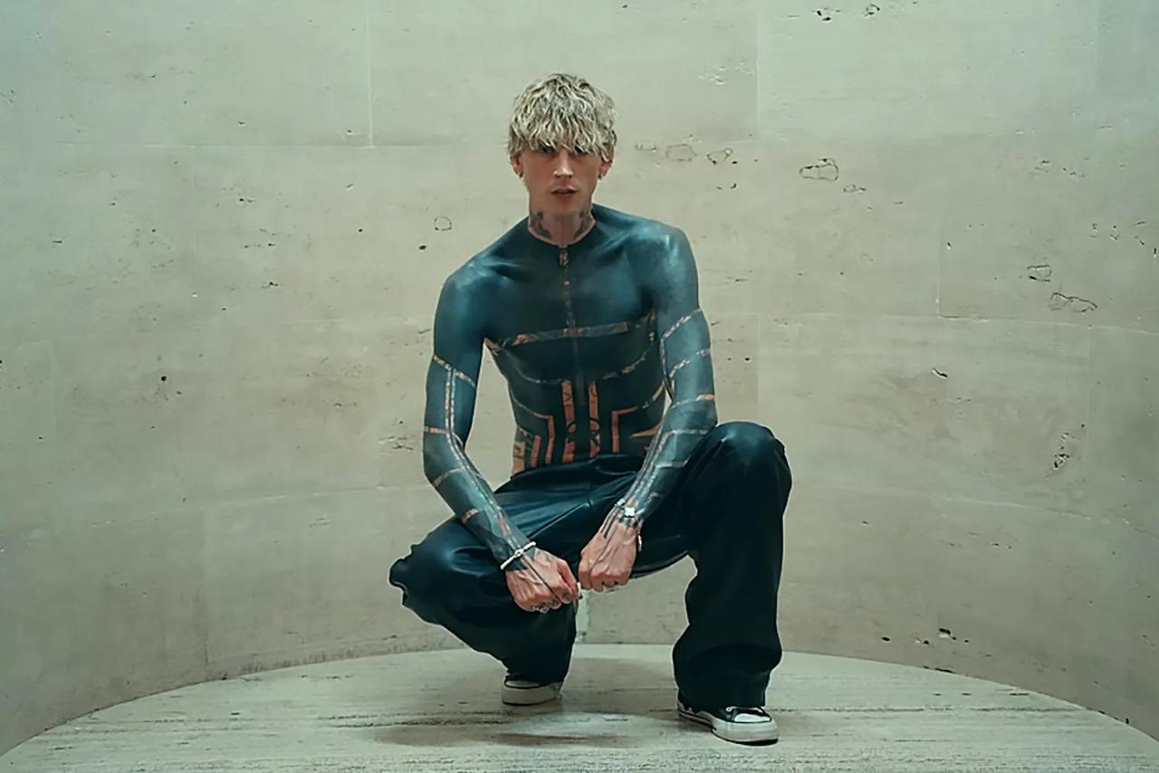 Machine Gun Kelly shares extreme body art process pushed him to limit
