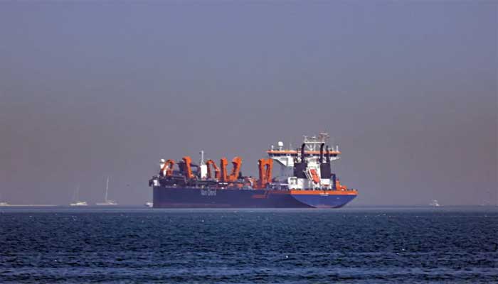 Iran suspends Hormuz transit charges for 60 days under US deal