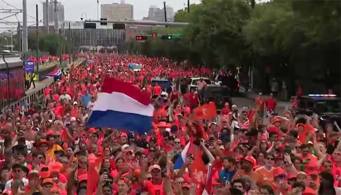 Netherlands and Sweden fans march to Houston stadium ahead of World Cup clash