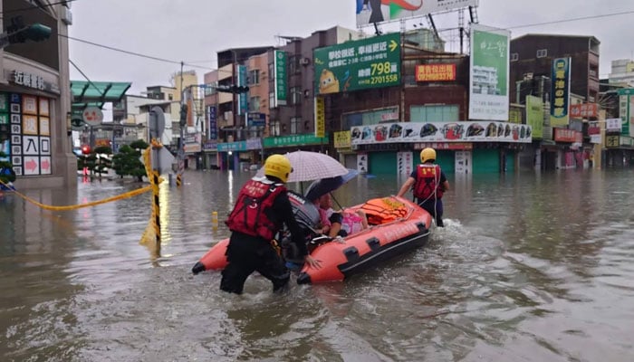 Japan: Four injured, more than 100 flights cancelled as twin storms close in