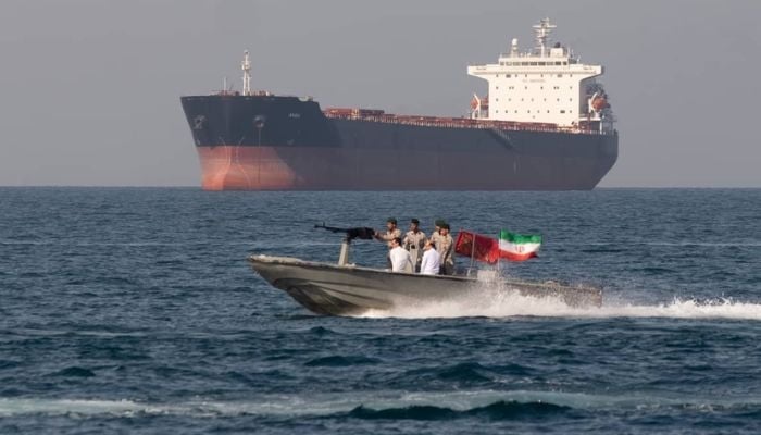 Iran strikes commercial ships in Strait of Hormuz, risking fragile U.S. agreement